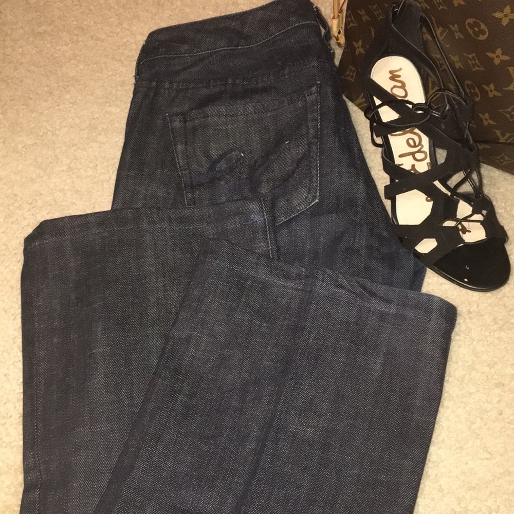 Express flare dark wash jeans.